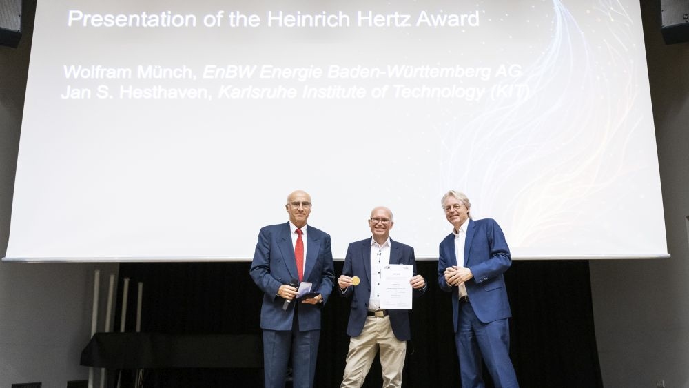 Jürgen Janek with Wolfram Münch from EnBW and KIT President Jan. S Hesthaven