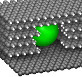 Nanoparticle etching a tunnel into graphite